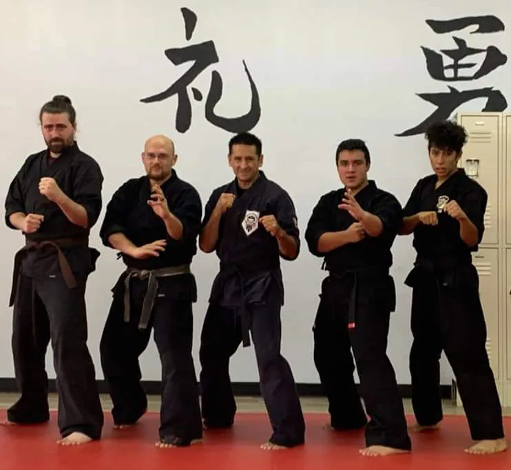 Legacy martial artists together in the dojo