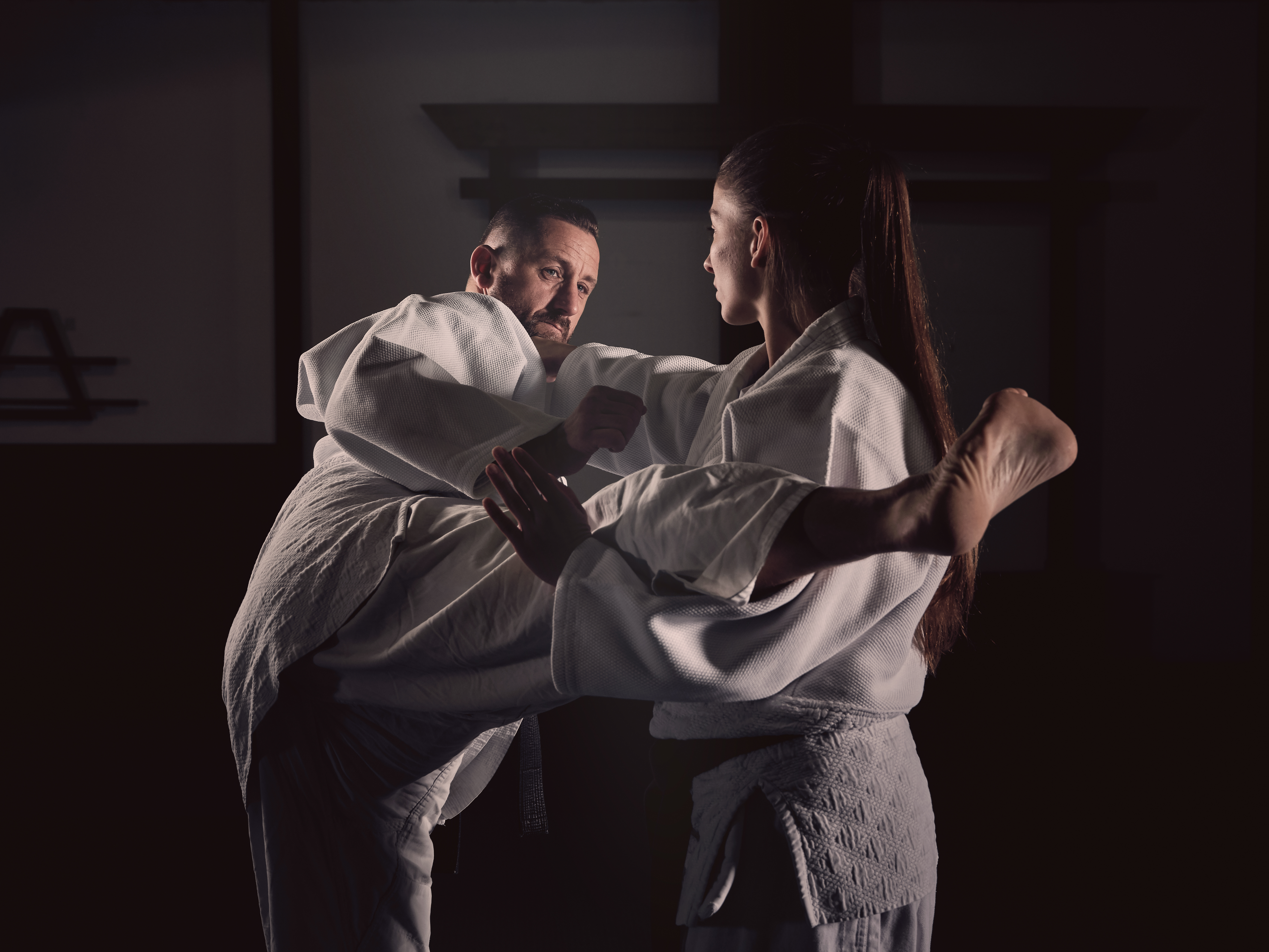 Adult Woman and Man Fighting in Gym